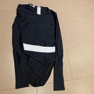 Black with white band full body long sleeve bathing suit